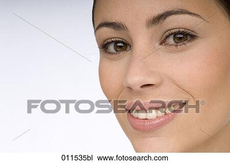 young woman looking into the camera View Large Photo Image Stock Image - young woman looking into the camera. Fotosearch