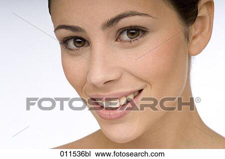 young woman looking into the camera View Large Photo Image Stock Image - young woman looking into the camera. Fotosearch