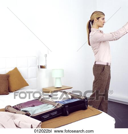Stock Image - arriving, artificial light, arrival. Fotosearch