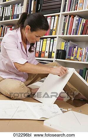artificial light, casual, assembling, accuracy View Large Photo Image Stock Image - artificial light, casual, assembling, accuracy. Fotosearch