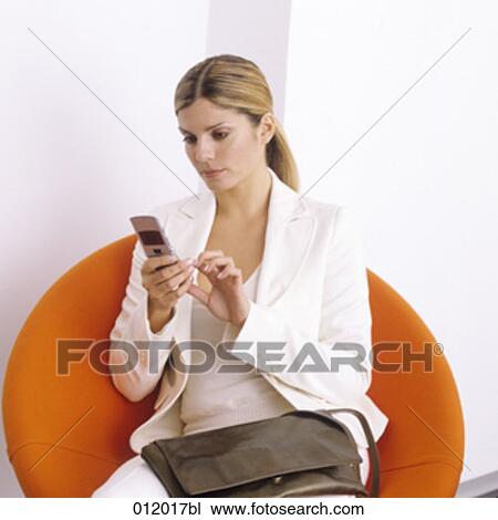 Stock Image - bag, blond hair, artificial light. Fotosearch