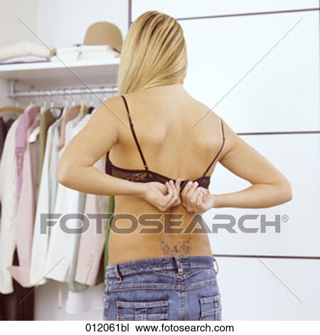 Stock Image - black, blond hair, artificial light. Fotosearch