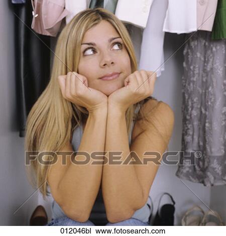 Stock Image - blond hair, blonde, artificial light. Fotosearch