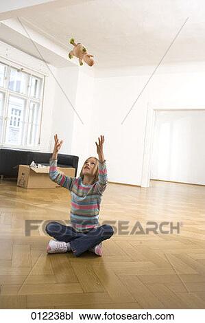 Stock Image - blonde, Yashoda, blond hair, artificial light, apartment, 7-9 years. Fotosearch