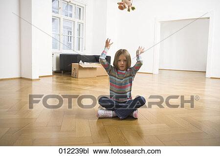 Stock Image - blonde, Yashoda, blond hair, artificial light, apartment, 7-9 years. Fotosearch