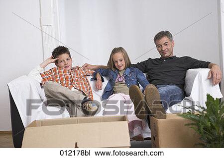 Stock Image - boy, 7-9 years, artificial light, apartment, Yashoda, 10-12 years. Fotosearch