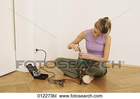 Stock Image - brown hair, brown haired, artificial light. Fotosearch