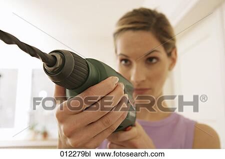 Stock Image - brown hair, brown haired, artificial light. Fotosearch