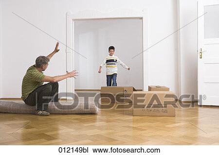 Stock Image - carpet, Yashoda, boy, artificial light, apartment, 10-12 years. Fotosearch