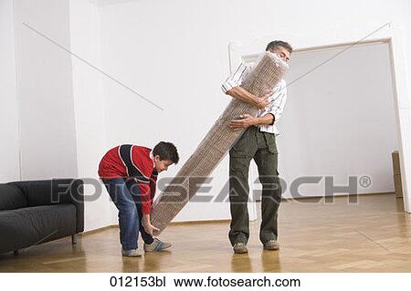 Stock Image - carpet, Yashoda, boy, artificial light, apartment, 10-12 years. Fotosearch