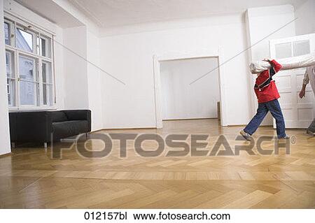 Stock Image - carpet, Yashoda, boy, artificial light, apartment, 10-12 years. Fotosearch