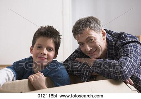 carton box, Yashoda, boy, artificial light, apartment, 10-12 years View Large Photo Image Stock Image - carton box, Yashoda, boy, artificial light, apartment, 10-12 years. Fotosearch