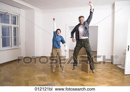 Stock Image - carton box, Yashoda, boy, artificial light, apartment, 10-12 years. Fotosearch