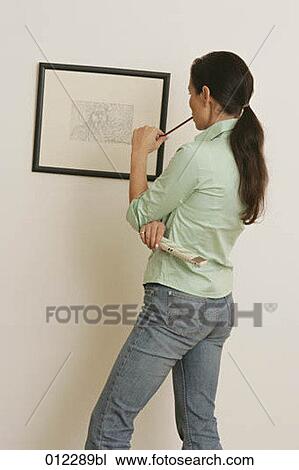 casual, checking, caucasian, artificial light View Large Photo Image Stock Image - casual, checking, caucasian, artificial light. Fotosearch