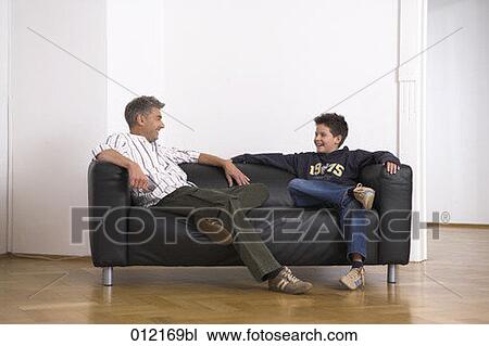 Stock Image - casual, Yashoda, boy, artificial light, apartment, 10-12 years. Fotosearch