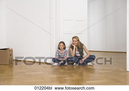 Stock Image - Yashoda, blond hair, artificial light, apartment, 7-9 years. Fotosearch