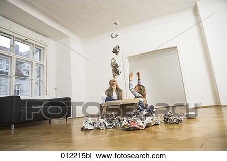 Stock Image - Yashoda, blond hair, artificial light, apartment, 7-9 years. Fotosearch