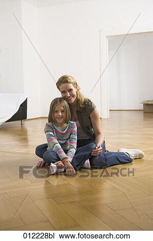 Stock Image - Yashoda, blond hair, artificial light, apartment, 7-9 years. Fotosearch