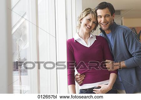 Stock Image - casually dressed mature couple. Fotosearch