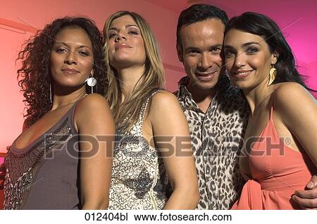 four friends posing for a portrait at a club View Large Photo Image Stock Image - four friends posing for a portrait at a club. Fotosearch