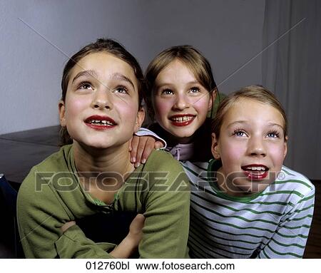 group of three astonished looking children View Large Photo Image Stock Image - group of three astonished looking children. Fotosearch