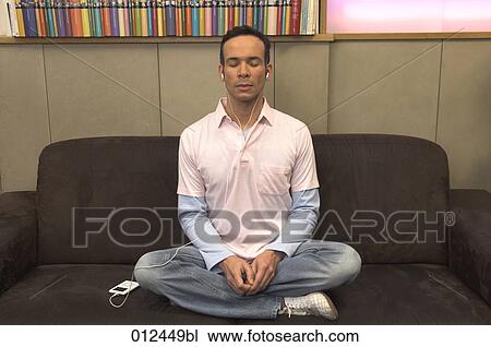 man listening to music on ipod with closed eyes View Large Photo Image Stock Image - man listening to music on ipod with closed eyes. Fotosearch