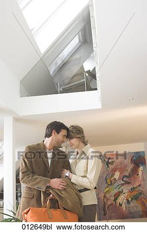 mature couple arm in arm in maisonette View Large Photo Image Stock Image - mature couple arm in arm in maisonette. Fotosearch