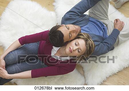 mature couple sitting back to back with eyes closed View Large Photo Image Stock Image - mature couple sitting back to back with eyes closed. Fotosearch