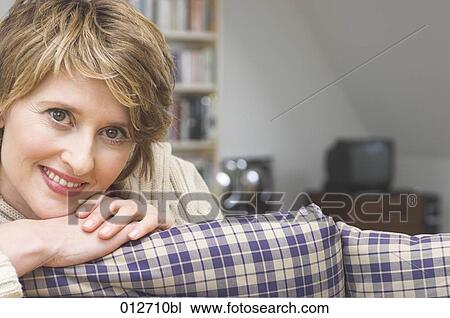 middle aged woman smiling at camera View Large Photo Image Stock Image - middle aged woman smiling at camera. Fotosearch