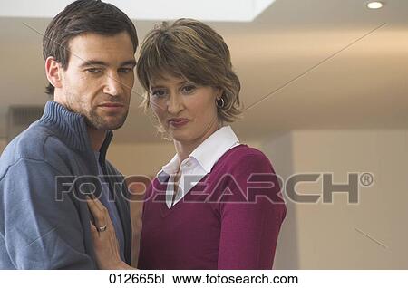 portrait of couple with disgusted look on their faces View Large Photo Image Stock Image - portrait of couple with disgusted look on their faces. Fotosearch
