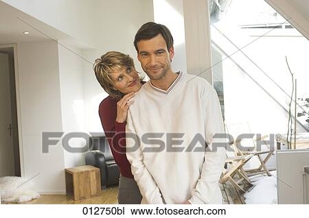 portrait of mature couple woman giving a mischievous smile View Large Photo Image Stock Image - portrait of mature couple woman giving a mischievous smile. Fotosearch