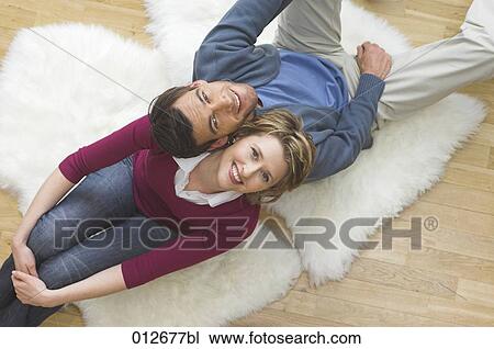 portrait of maure couple sitting back to back View Large Photo Image Stock Image - portrait of maure couple sitting back to back. Fotosearch