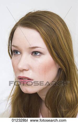 portrait of red haired young woman with tearstained eyes View Large Photo Image Stock Image - portrait of red haired young woman with tearstained eyes. Fotosearch