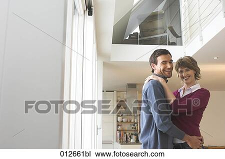 portrait of smiling mature couple in maisonette View Large Photo Image Stock Image - portrait of smiling mature couple in maisonette. Fotosearch