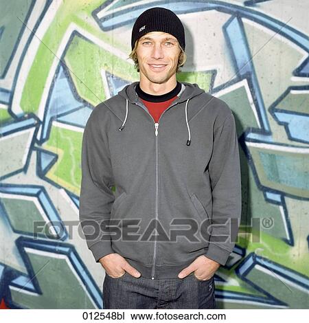 portrait of teenage boy in trendy outfit View Large Photo Image Stock Image - portrait of teenage boy in trendy outfit. Fotosearch