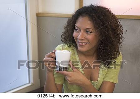 portrait of woman holding coffee cup View Large Photo Image Stock Image - portrait of woman holding coffee cup. Fotosearch