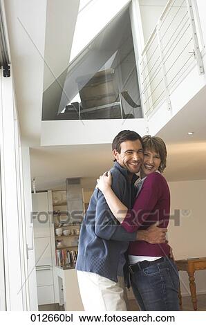 smiling mature couple in close embrace View Large Photo Image Stock Image - smiling mature couple in close embrace. Fotosearch