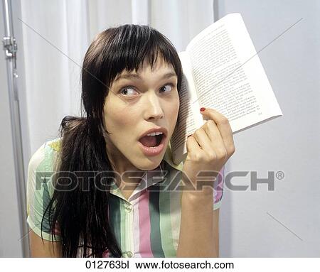 symbolic image of young woman listening to audio book View Large Photo Image Stock Image - symbolic image of young woman listening to audio book. Fotosearch