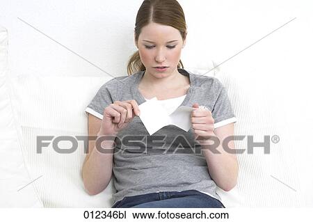 teenager tearing a photography apart View Large Photo Image Stock Image - teenager tearing a photography apart. Fotosearch