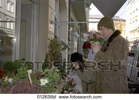 young couple buying flowers View Large Photo Image Stock Image - young couple buying flowers. Fotosearch