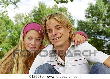 young couple facing camera View Large Photo Image Stock Image - young couple facing camera. Fotosearch