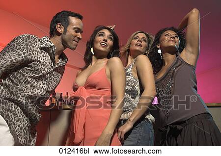 young people dancing together in nightclub View Large Photo Image Stock Image - young people dancing together in nightclub. Fotosearch