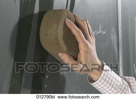 close-up of hand cleaning blackboard with sponge View Large Photo Image Stock Image - close-up of hand cleaning blackboard with sponge. Fotosearch