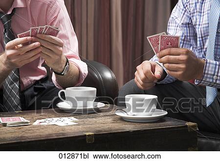 close-up of young men playing cards View Large Photo Image Stock Image - close-up of young men playing cards. Fotosearch