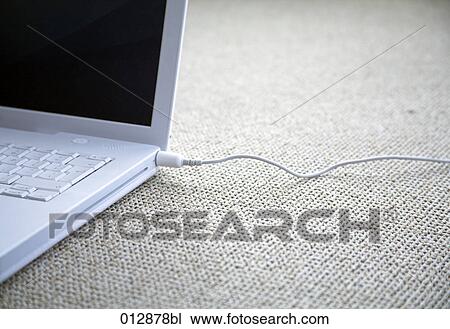 detail of laptop computer and cable View Large Photo Image Stock Image - detail of laptop computer and cable. Fotosearch