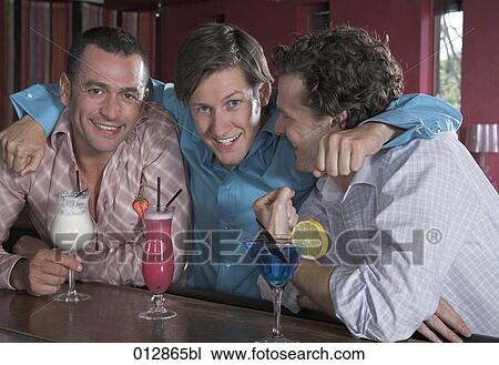 group of three friends posing for a photo at bar View Large Photo Image Stock Image - group of three friends posing for a photo at bar. Fotosearch