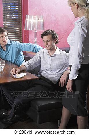 guest paying with credit card in restaurant View Large Photo Image Stock Image - guest paying with credit card in restaurant. Fotosearch