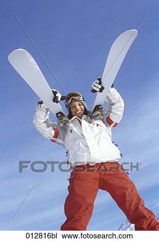 portrait of young woman carrying sledge on her back View Large Photo Image Stock Image - portrait of young woman carrying sledge on her back. Fotosearch