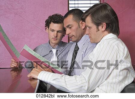 three men sitting in restaurant together reading menu View Large Photo Image Stock Image - three men sitting in restaurant together reading menu. Fotosearch