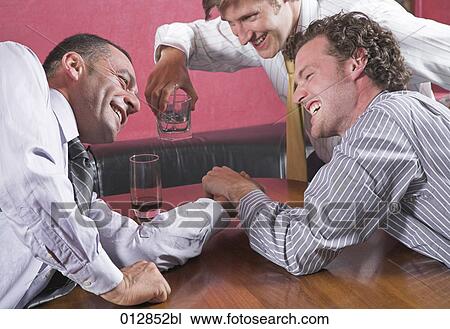 two friends arm wrestling in nightclub View Large Photo Image Stock Image - two friends arm wrestling in nightclub. Fotosearch